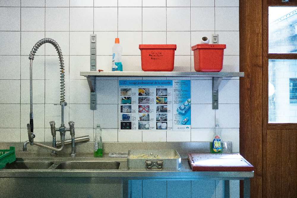 Cleaning supplies neatly stored